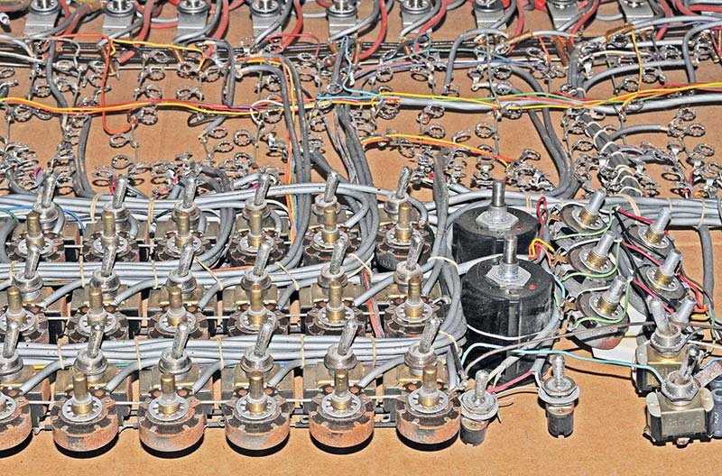 Figure 6 — Rear of the ES-400 front panel showing the dense wiring harness connected to all 364 banana jacks — the harness is best removed as a single assembly