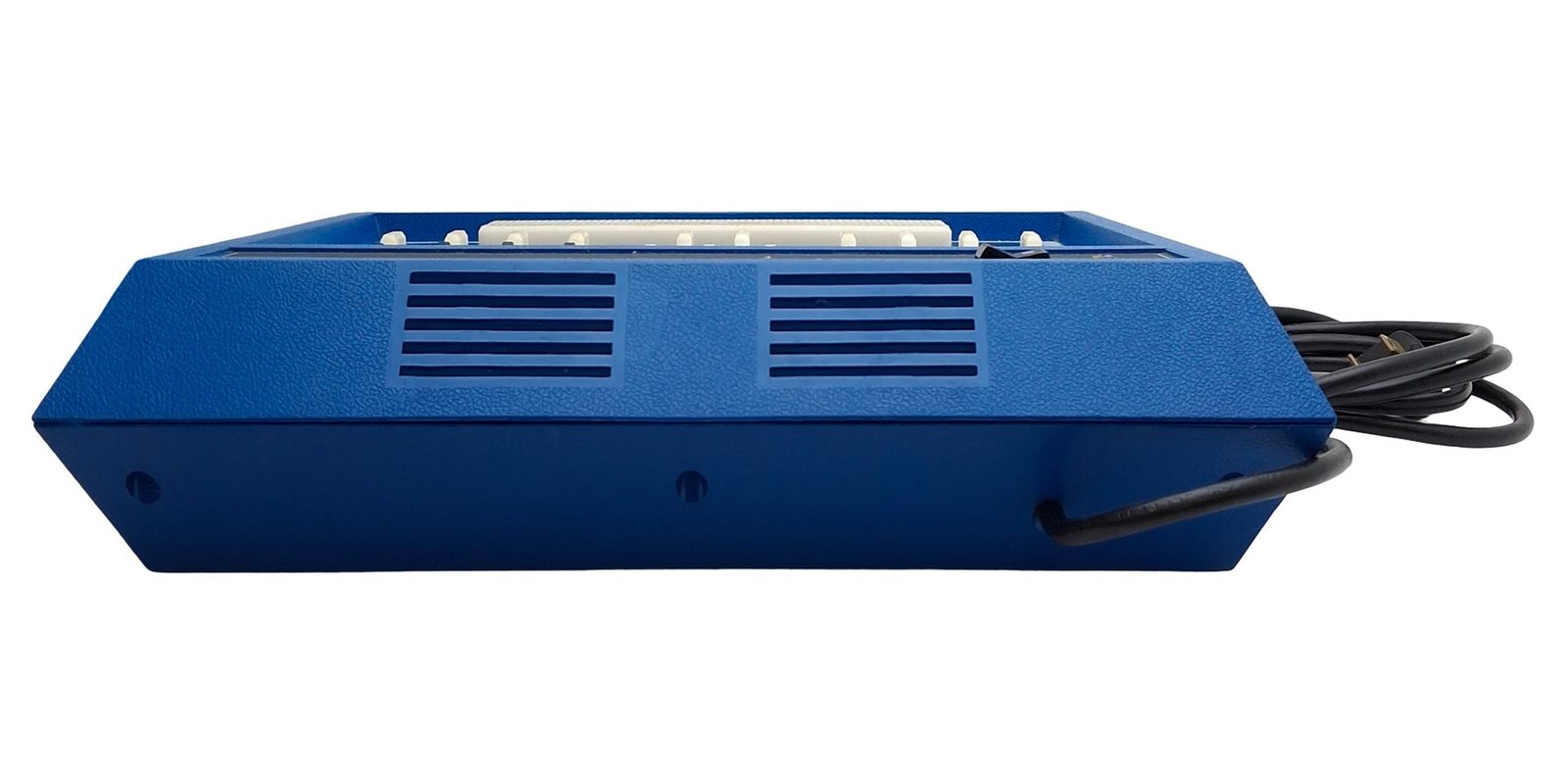 Figure 7 — The rear of the blue ET-3200A: two banks of ventilation slots in the cabinet bottom. The cord leaves the cabinet near one rear corner.