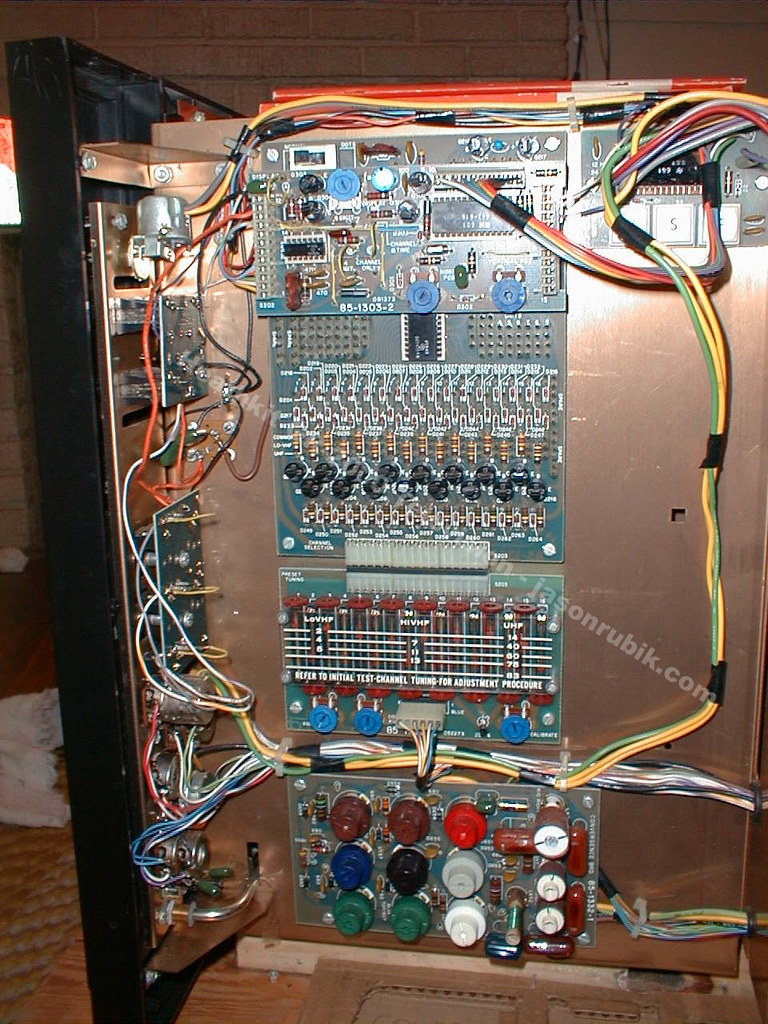 Figure 4 — The rear of a finished GR-2000: the plug-in boards ranged on the panel, each in its own connector, with the cable harness dressed along the chassis.