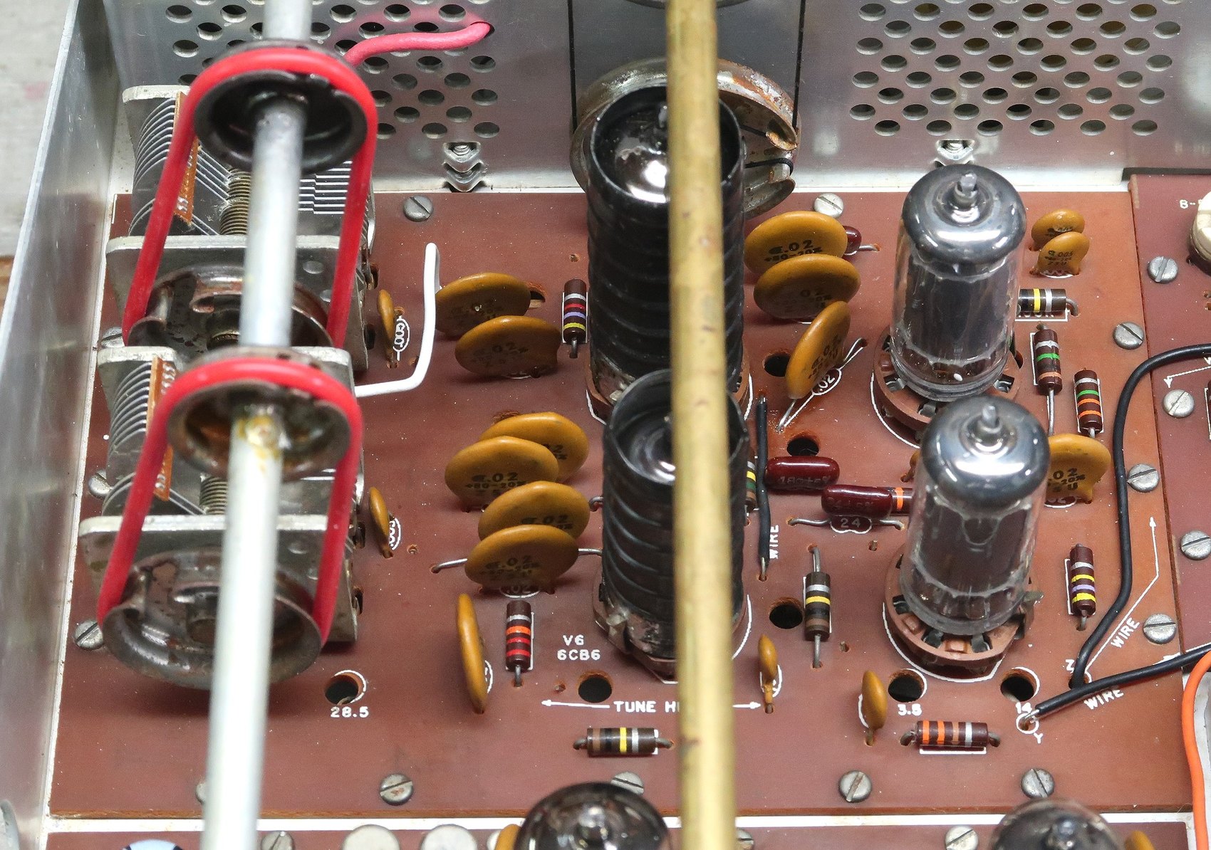 Figure 10 — The RF-driver board (designators 400–499) carrying V10 and V11, the 6HS6 front-end pair, with V6 and the 6CL6 driver. The white "driver neutralizing wire" that sets V7's neutralisation runs across …