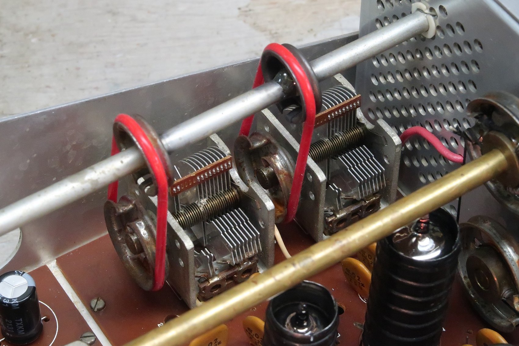 Figure 8 — New silicone belts on the driver preselector capacitors. Perished belts are the commonest single reason an otherwise healthy HW-101 will not peak.