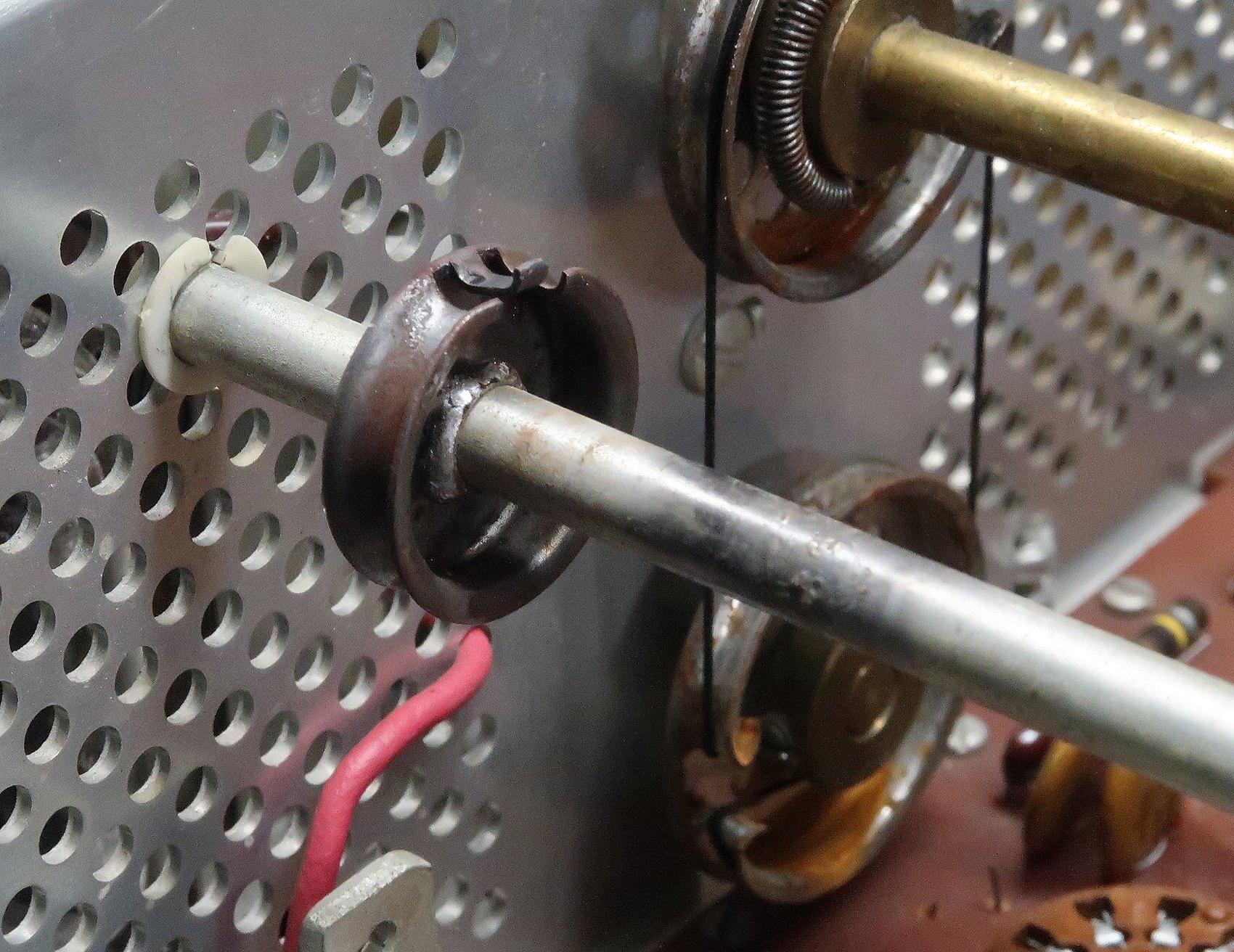 Figure 6 — The same drum with the old solder ground away and the shaft cleaned, ready for adhesive.