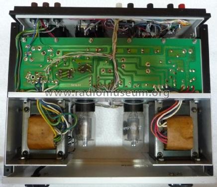 Figure 3 — Internals showing the green solid-state circuit board — the silicon rectifiers and the ten-zener reference stack that replaced the IP-32's pair of 0A2 VR tubes — the clearest visible differentiator…