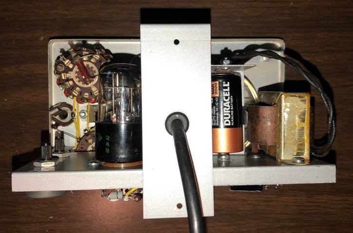 Figure 6 — The rear of a rebuilt V-6 chassis: the 6H6 AC-converter tube, the ohms battery in its clip, the AC and DC calibration potentiometers and the power transformer. On this generation the calibration co…