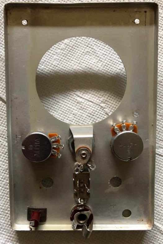 Figure 9 — The back of a cleaned V-6 front panel with the controls, jacks and power switch reinstalled. Heath's panels usually come up with warm water and washing-up liquid; the wrinkle-finish cabinet paint i…